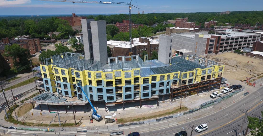 A construction site with a partially finished building.